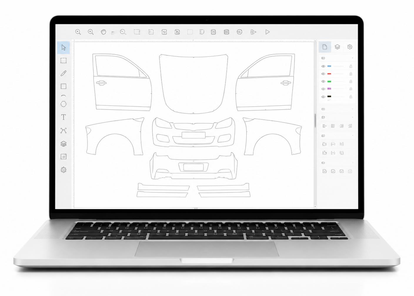 Laptop mit geöffneter Schneidesoftware und Fahrzeug-Bauteilen als Schnittvorlage